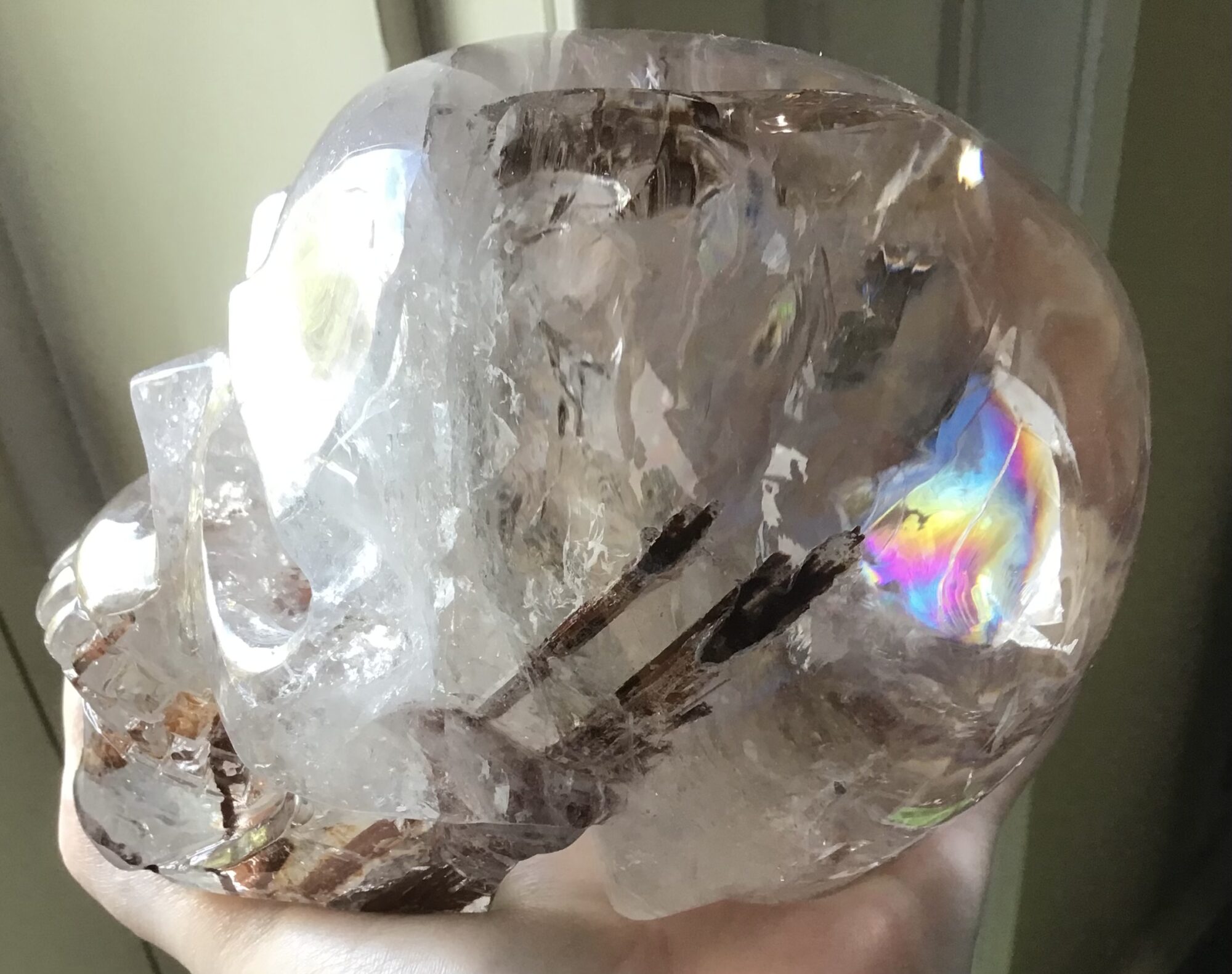 Clear Quartz Crystal Skull With Tourmaline