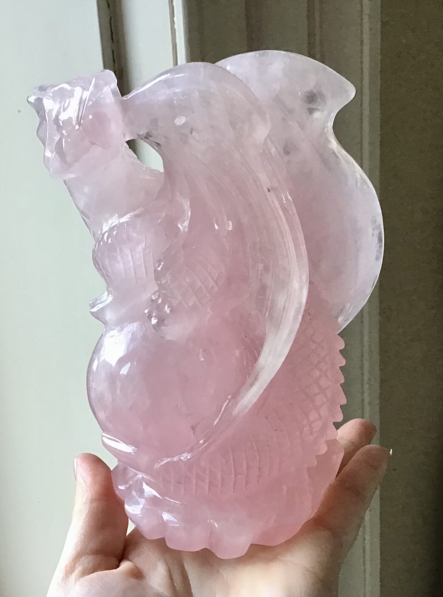 Rose Quartz Crystal Dragon on Crystal Ball